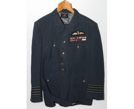 British Royal Air Force uniform, a blue jacket with R E City Ltd of London label, having Gaunt of London buttons, quadruple b