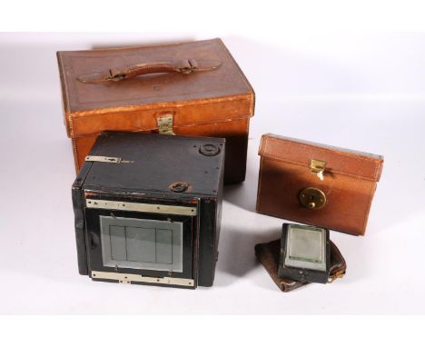 Newman and Sinclair box plate camera patent number 20018 10, in leather case with two additional lenses and a further leather