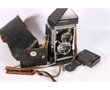 Mamiya C3 dual lens camera with Mamiya Sekor 1:28 f=80mm lenses, number 239482, having Porroflex viewfinder 