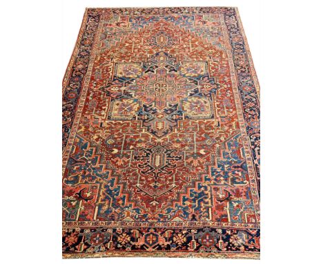 ANTIQUE PERSIAN HERIZ CARPET, 345cm x 246cm.