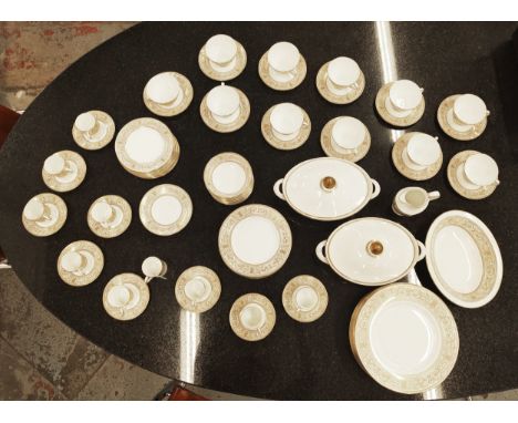 ROYAL DOULTON DINNER SERVICE, comprising twelve dinner plates, eleven tea cups and saucers, twelve salad plates, twelve bread