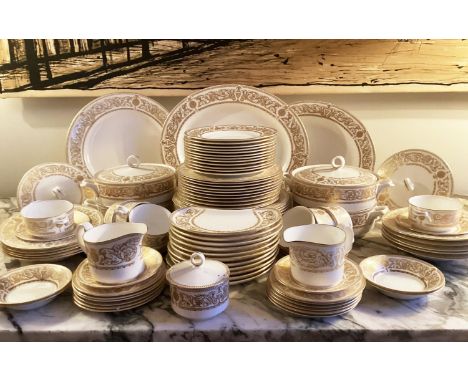 DINNER SERVICE, English Bone China Royal Worcester 'Hyde Park' gold, twelve place, six piece setting (eleven crescent salad p