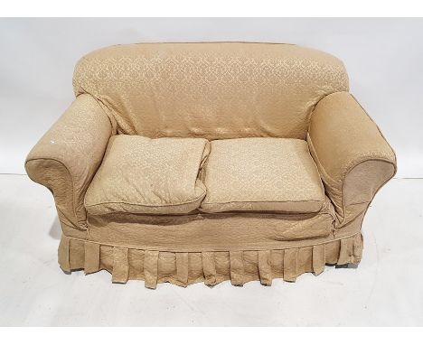 Late 19th/early 20th century two seat sofa in pale gold loose covers