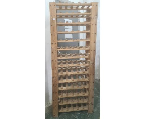 20th century pine bottle rack with 14 shelves, each shelf holds six bottles, 68cm x 174cm