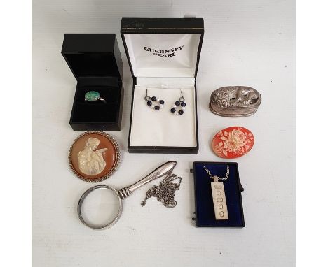 Silver ingot pendant on chain, a white metal box&nbsp;of oval form with hinged cover decorated with a lion, a ring set with g