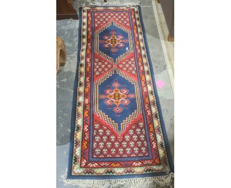 Modern Eastern-style runner&nbsp;with two central medallions on a red ground, stepped border, 210cm x 84cm