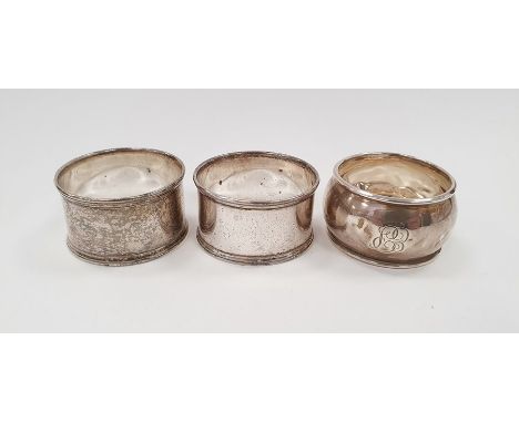 Silver napkin ring and a pair of silver plated napkin rings