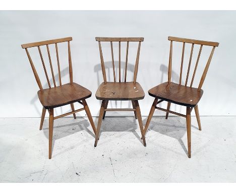 Set of three Ercol elm seated beech-framed stickback chairs (3) 