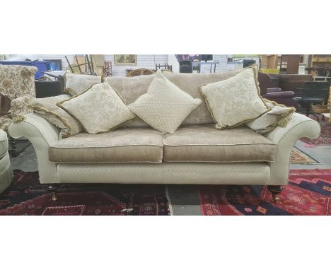 Lee Longlands three-seater sofa and matching chair in diamond-patterned upholstery, with brown trim cushions and a small brow