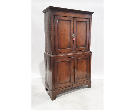19th century linen press, moulded cornice with two cupboard doors enclosing shelf and two cupboard doors under, bracket feet,