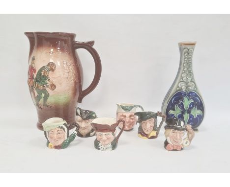 Royal Doulton large “Raleigh on Plymouth Ho” jug, moulded and painted with figures in Tudor dress playing bowls, 24cm high, a