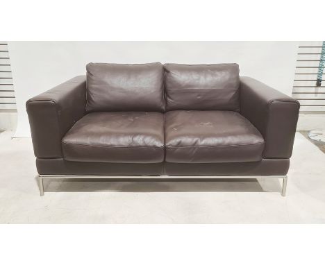 Modern two seater brown leather sofa with brushed steel base