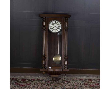 LATE 19TH CENTURY MAHOGANY VIENNA STYLE WALL CLOCK
by Gustav Becker, signed two train movement, the 7'' enamel dial with Roma