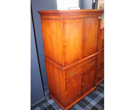 MODERN YEW WOOD CHEST OF DRAWERS
two short drawers over five long drawers, over bracket feet, 107cm high; together with a mod
