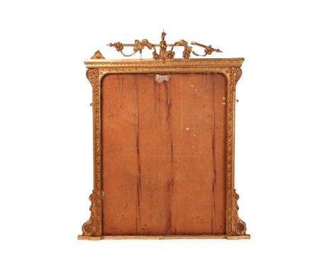 A late Victorian gilt gesso overmantel mirror frame (lacking glass), for restoration, the arrow and vine surmount above a rec