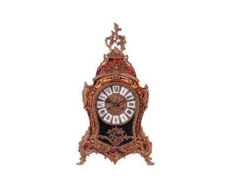 A large 20th-century Louis XV style boulle-effect mantel clock, the enamel chapter ring with Roman numerals, 57 cm x 31 cm.
