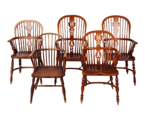 A 19th-century stick-backed ash and elm Windsor armchair with a saddled seat and "H" stretcher together with four 20th-centur