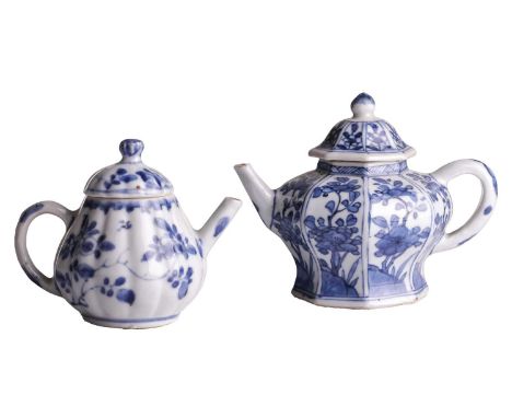 A Chinese Kangxi blue and white porcelain miniature wine pot and cover of panelled inverted baluster form, each face painted 