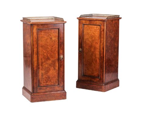 A pair of Victorian and later walnut and inlaid pot cupboards, both stamped Holland &amp; Sons, with three-sided pierced thre