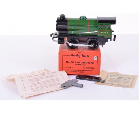 Hornby Trains 0 Guage No.30 Locomotive, late issue 0-4-0 working clockwork motor, in near mint condition, with key, guarantee