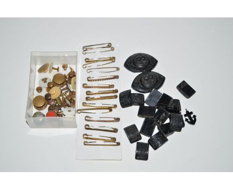 A quantity of jet; various buttons and tie pins.