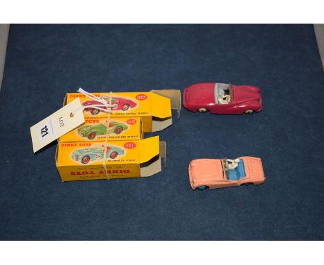 Three boxed Dinky die-cast sports cars, comprising: model no. 107 Sunbeam Alpine Sports; model no. 110 Austin Martin DB3 Spor