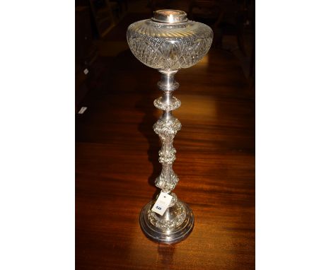 A Victorian EPNS table oil lamp stand with cut glass reservoir (missing lamp and shade).