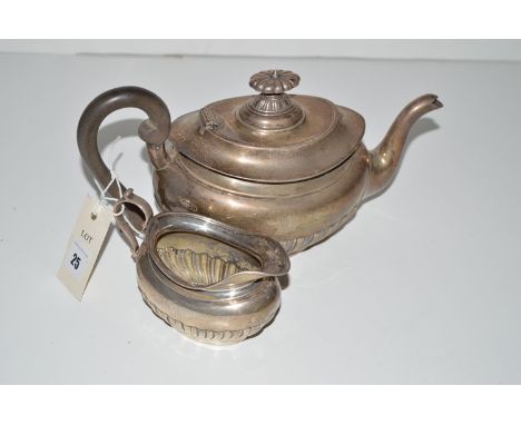 A George V silver teapot and cream jug, by Martin, Hall & Co., Sheffield, of half fluted form, 24oz. gross.