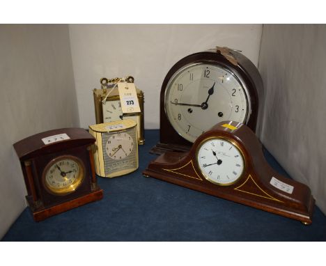 An Enfield bakelite mantel clock; together with four other clocks.