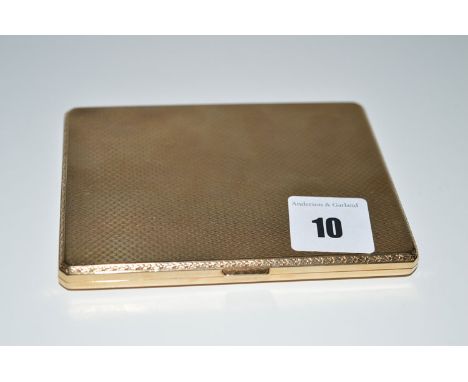 A 9ct. yellow gold cigarette case, by Northern Goldsmiths, Birmingham, engine turned decoration throughout, 135grms.