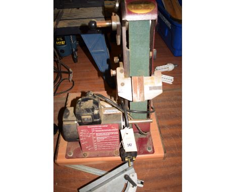 An electric Pro Edge bench sander.