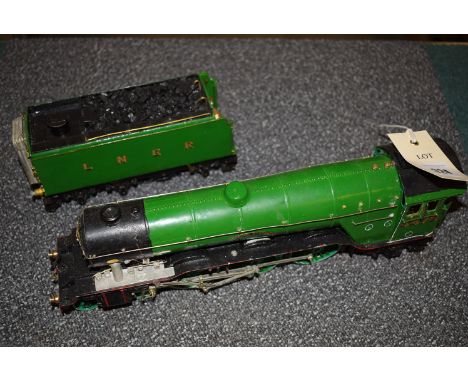 A metal model of The Flying Scotsman; and a coal tender.