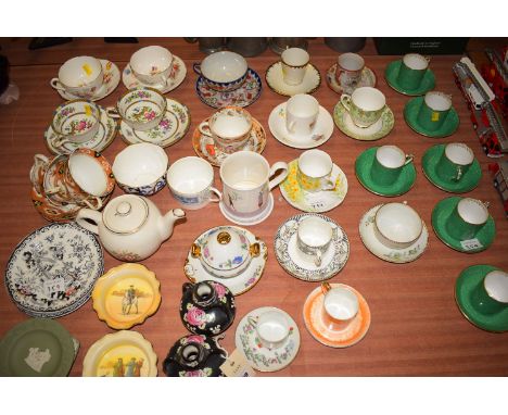 A large collection of specimen tea cups and saucers; coffee cans and saucers; together with sundry ceramics.