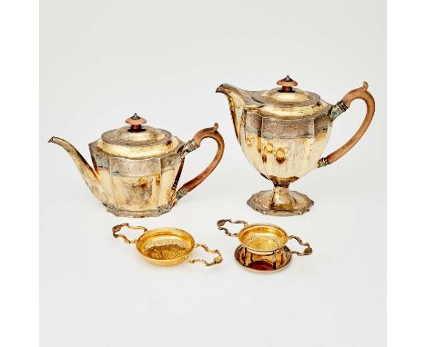 Percy Webster, London, 1937In the George III style, comprising a teapot, coffee pot, height 8 3/4 inches (22.3 cm), and two t