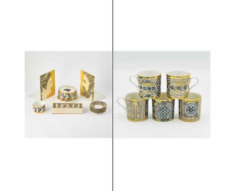 Comprising a pair of bookends, height 8 inches inches, width 6 inches; a small food or beverage warmer and a matching cup, a 