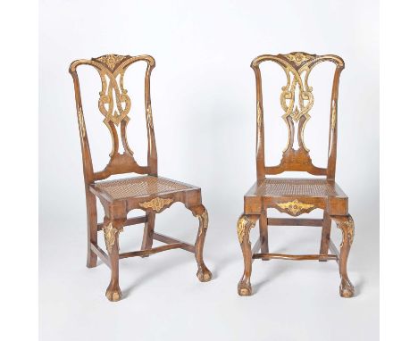 20th CenturyIn the Chippendale style, each with a caned seat with an upholstered loose cushion. Height 41 inches, width 20 in