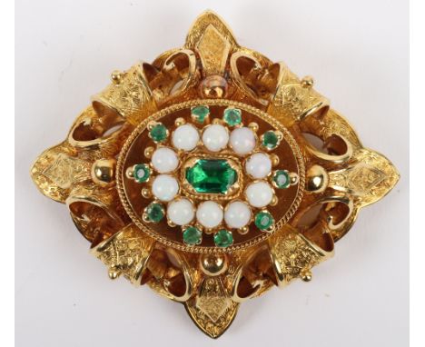 An 18ct gold, emerald and opal lozenge shaped brooch, centre emerald cut emerald 0.4 carat, with ten round opals surrounding 