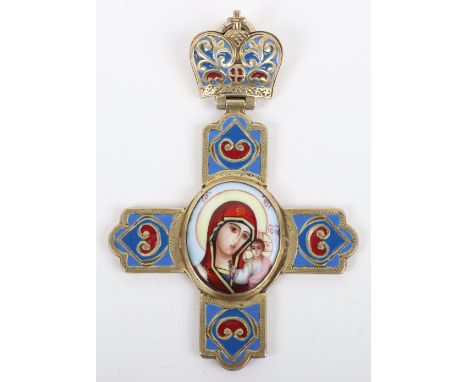 An early 20th century (1908-1926) silver gilt and enamel pectoral cross, St Petersburg, central oval enamel of Mother of God,
