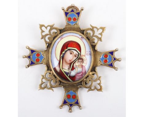 An early 20th century (1908-1926) silver gilt and enamel pectoral cross, maker AH St Petersburg, central oval enamel of Mothe
