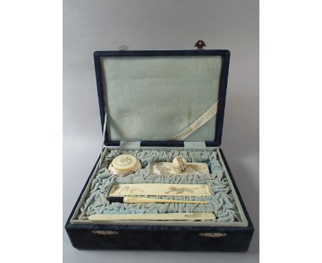 An Early 20th Century Japanese Ivory Desk Set in Original Case with Etched Lion and Tiger Decoration. Comprising Inkwell, Blo