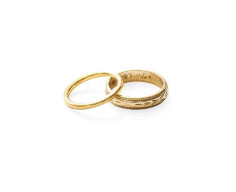 A 22 Carat Gold Band Ring, finger size G1/2 and A 9 Carat Gold Band Ring, finger size J22 carat gold ring - 2.1 grams. 9 cara