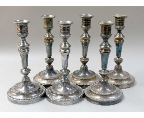 A Set of Six French Silver Plate Candlestick, by Christofle, Paris, 20th Century, each on circular beaded base and with taper