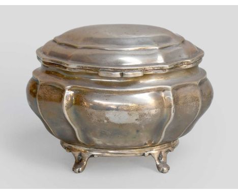 A George V Silver Tea-Caddy, Probably by Charles Stuart Harris, London, 1899, shaped oval and on four tapering feet, the hing