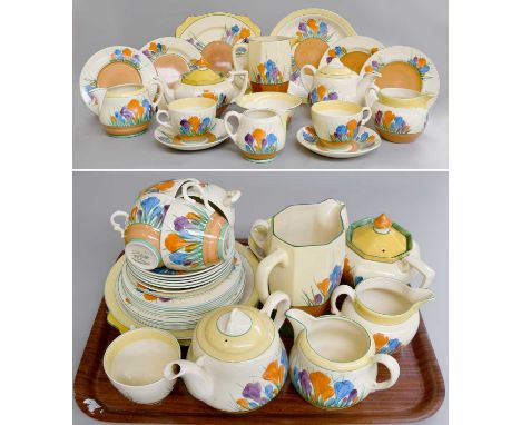 Clarice Cliffe Pottery "Crocus" Pattern, including, an octagonal teapot and cover, another teapot and cover, three milk jugs,