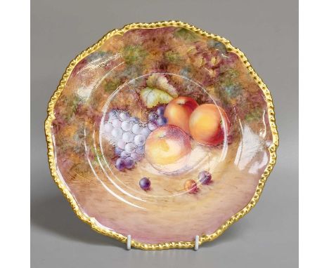A Royal Worcester Porcelain Plate, 1960s, by S, Weston, painted with apples and grapes under a gilt gadrooned border, signed 