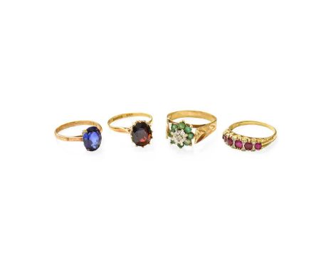 Four Gem-Set Rings, comprising of a 9 carat gold garnet ring, finger size N; a synthetic sapphire ring, stamped '9CT', finger