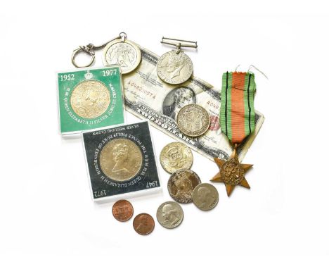 A Small Assortment of Coins and Medals, including; 2x USA 'Morgan' dollars, 1881O and 1880O (on a keychain); 2x UK, crowns 18