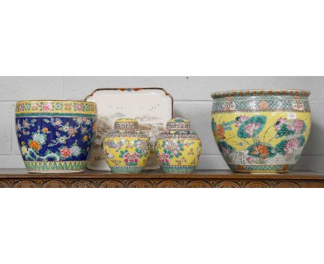 A Pair of Japanese Porcelain Ginger Jars and Covers, early 20th century, Yellow ground and painted with flowers and butterfli
