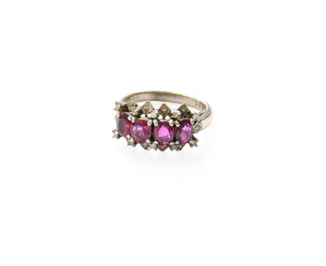 A Red Stone and Diamond Cluster Ring, four oval cut red stones within a border of eight-cut diamonds, in white claw settings,