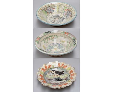 Maureen Minchin (b. 1954): A Pottery Dish, with lobed border moulded with shells, painted with a puffin and a fish, impressed
